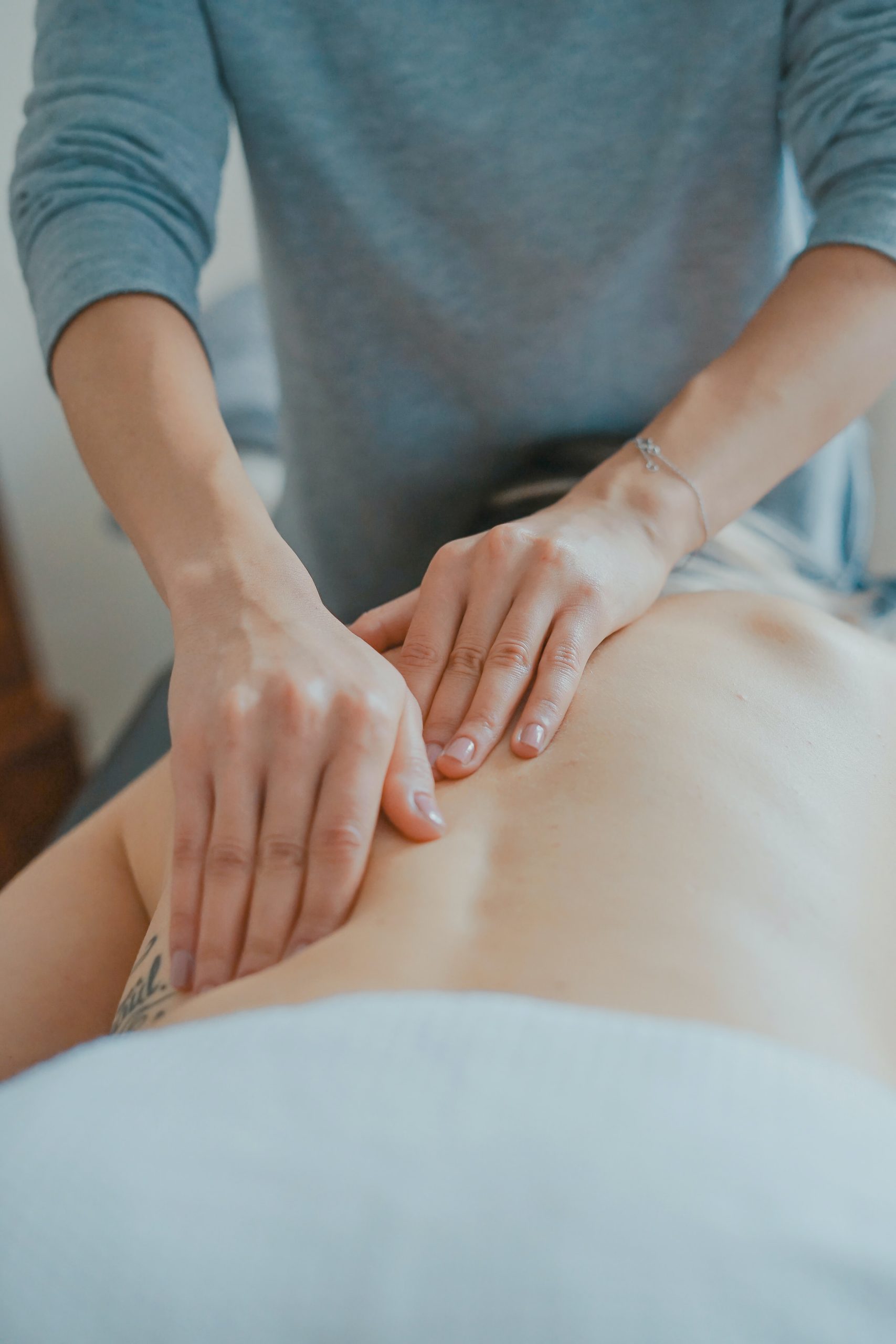 A person receiving physiotherapy from one of our qualified physiotherapists